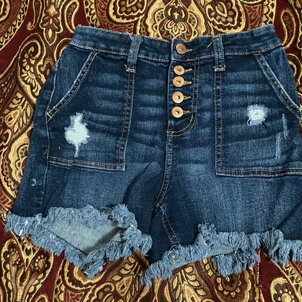 High rise NO BOUNDARIES cut off shorts already store bought that way.